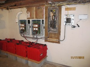 Battery bank, inverters and emergency breaker panel on DIY Solar installation